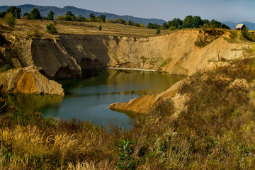 Solotvyno, Ukraine - September 29. 2016: Start of ecological disaster - karst failures at the site of one of the mines, where salt was mined previously.
