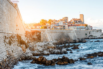 Landscape view on the old coastal village and fortification of Antibes on the french riviera in France - obrazy, fototapety, plakaty