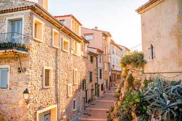 Street view in Antibes coastal village on the french riviera in France - obrazy, fototapety, plakaty