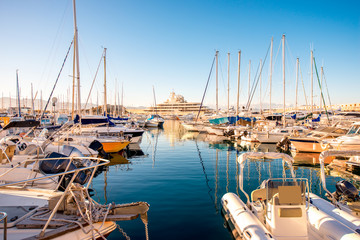 Fototapeta premium Sunset view on the harbor with expensive yachts on the french riviera in Antibes village in France