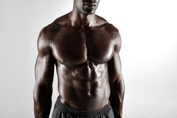 Fototapeta premium Shirtless african man with muscular abs