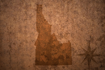 idaho state map on a old vintage crack paper background