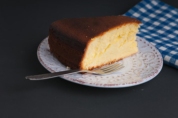 piece of cake on a black stone surface