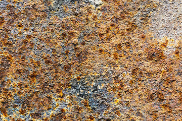 The surface of metal sheet covered with rust.