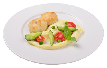 mashed potatoes with meatballs and vegetables, isolated.