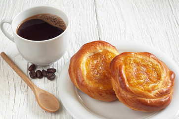 Buns and coffee cup