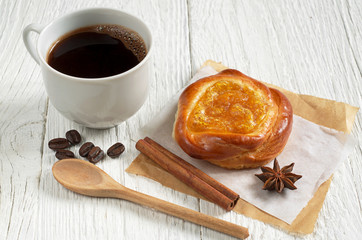 Coffee cup and bun