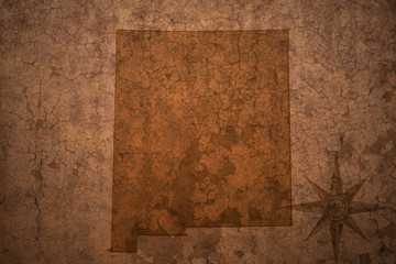 new mexico state map on a old vintage crack paper background