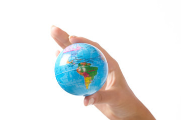 woman's hand with globe