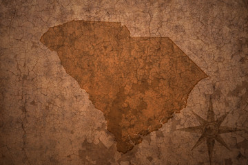 south carolina state map on a old vintage crack paper background