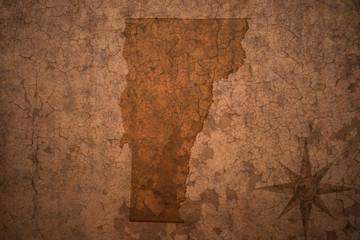 vermont state map on a old vintage crack paper background