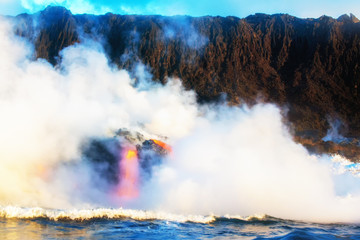 Molten lava flowing into the Pacific Ocean on Big Island of Hawaii, USA