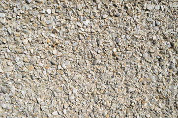 Small gravel stone wall background 