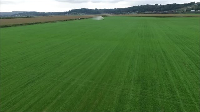 Aerial flyover of a field of alfalfa 
