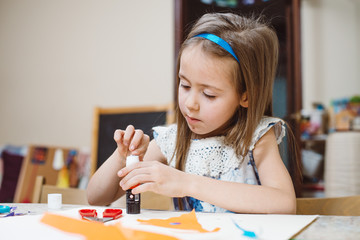 Small girl doing applique