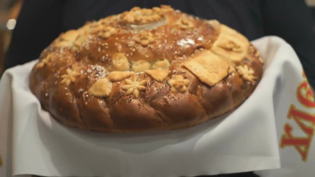 Woman holds a lush delicious loaf