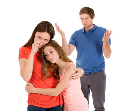 Daughter Comforting Mother While Her Parent Having Conflict