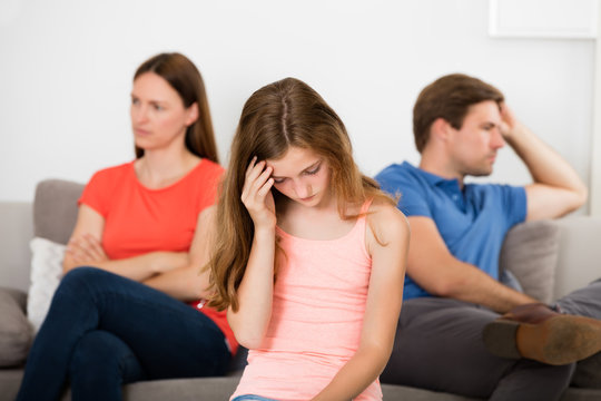 Girl Upset With Her Parent's Argument