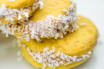 Vegan sweet biscuits with coconut on a white plate