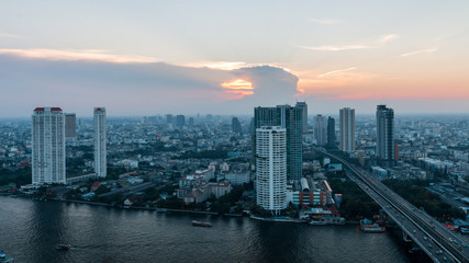 Bangkok Transportation with Modern Business Building along the river (Thailand)