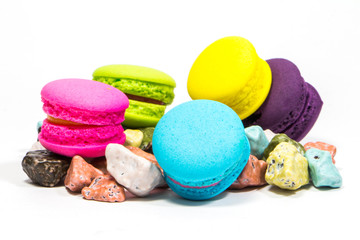 French colorful macarons isolated on white
