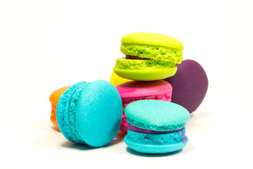French colorful macarons isolated on white