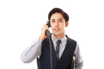 予約をとる笑顔のウェイター