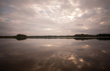 Swedish calm lake photographed in daytime with long exposure