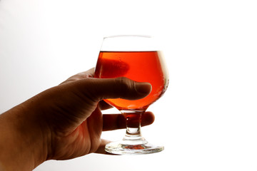Hand holding a glass of wine