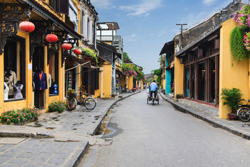 Cyclo in Hoi An Ancient Town, Quang Nam, Vietnam. Hoi An is recognized as a World Heritage Site by UNESCO.
