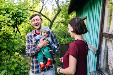 young family with a child on the nature