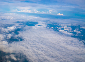 Beautiful cloudy sky abstract background concept related idea. View from airplane window