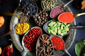 Food background with old vintage spoons and spices