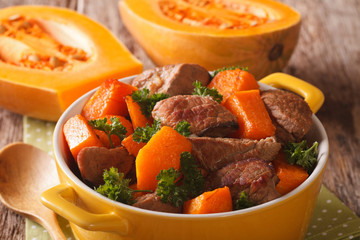 Healthy food: Beef stew with pumpkin and spices close up. horizontal
