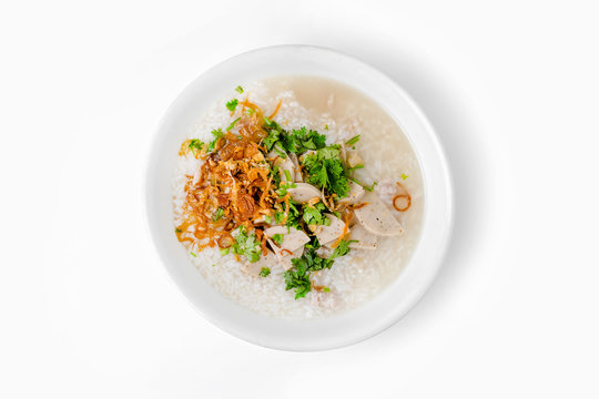 'Khao Tom Moo' Thai Breakfast, Rice congee mixed with meat on wh