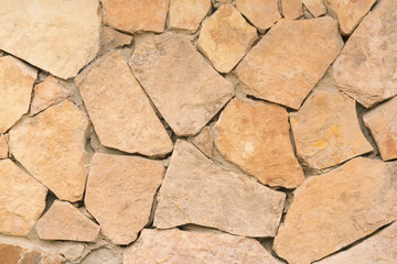 Brown wall with masonry, background