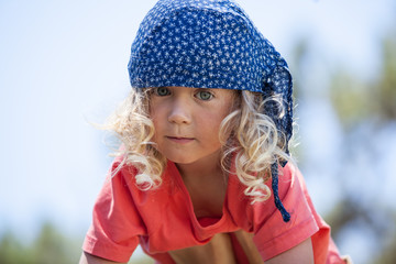 Adorable kid wearing bandana