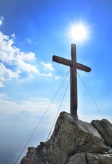 Naklejka premium Wooden cross on top of the Predne Solisko peak in High Tatras mountain.