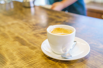 White Coffee cup on table in cafe