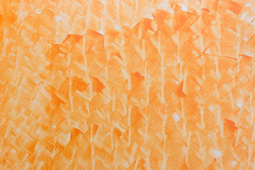 Abstract art orange color paint in cement wall.