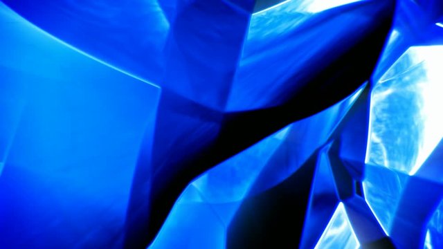 Blue abstract shiny glass background seamless loop