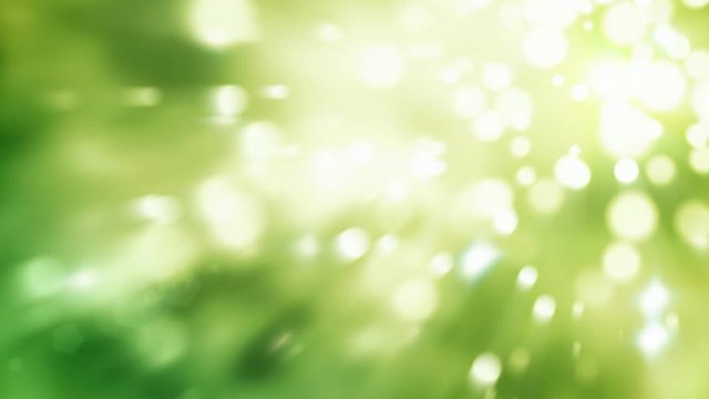 Bokeh light particles green abstract background seamless loop