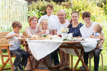 Most beautiful happy family in garden