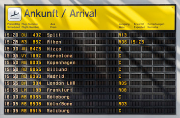 Airport timetable showing arrival times in Berlin. Worldwide arrivals