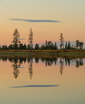Solnedgang ved tjernet