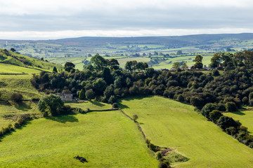View of farm land and River Dove in Crowdecote