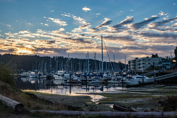 Beutiful bright sunrise over harbor town