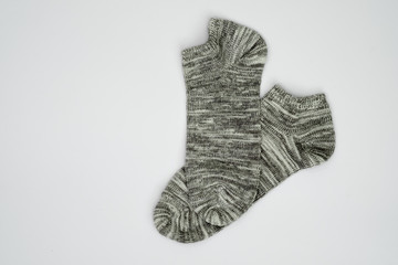 Pair of socks on white background.