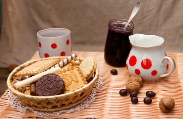 Still life with cookies and a cup of the sugar