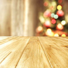 xmas tree and wooden table place 